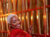 How to Dress for Yourself and Feel Confident at Any Size: Plus Size Style Tips That Truly Fit Confident woman in red dress How to Dress for Yourself and Feel Confident at Any Size: Plus Size Style Tips That Truly Fitwith a radiant smile indoors.